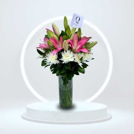 Pink Lilies in glass vase